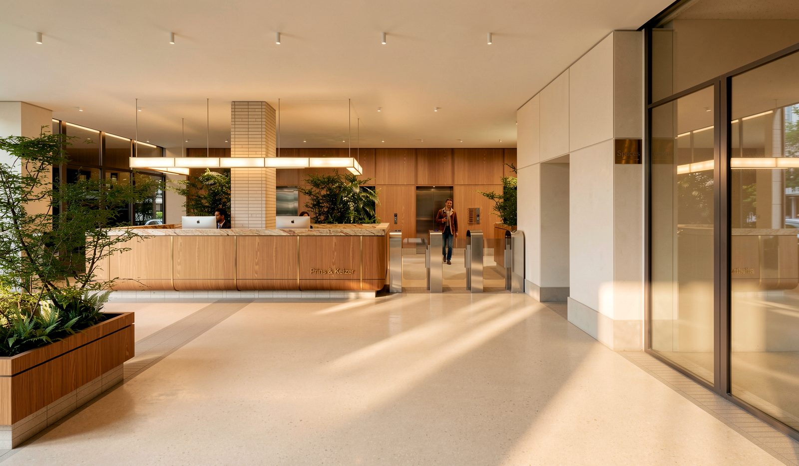 Timber-lined workplace lounge with pendant lighting and long communal table, visualised by Ditt