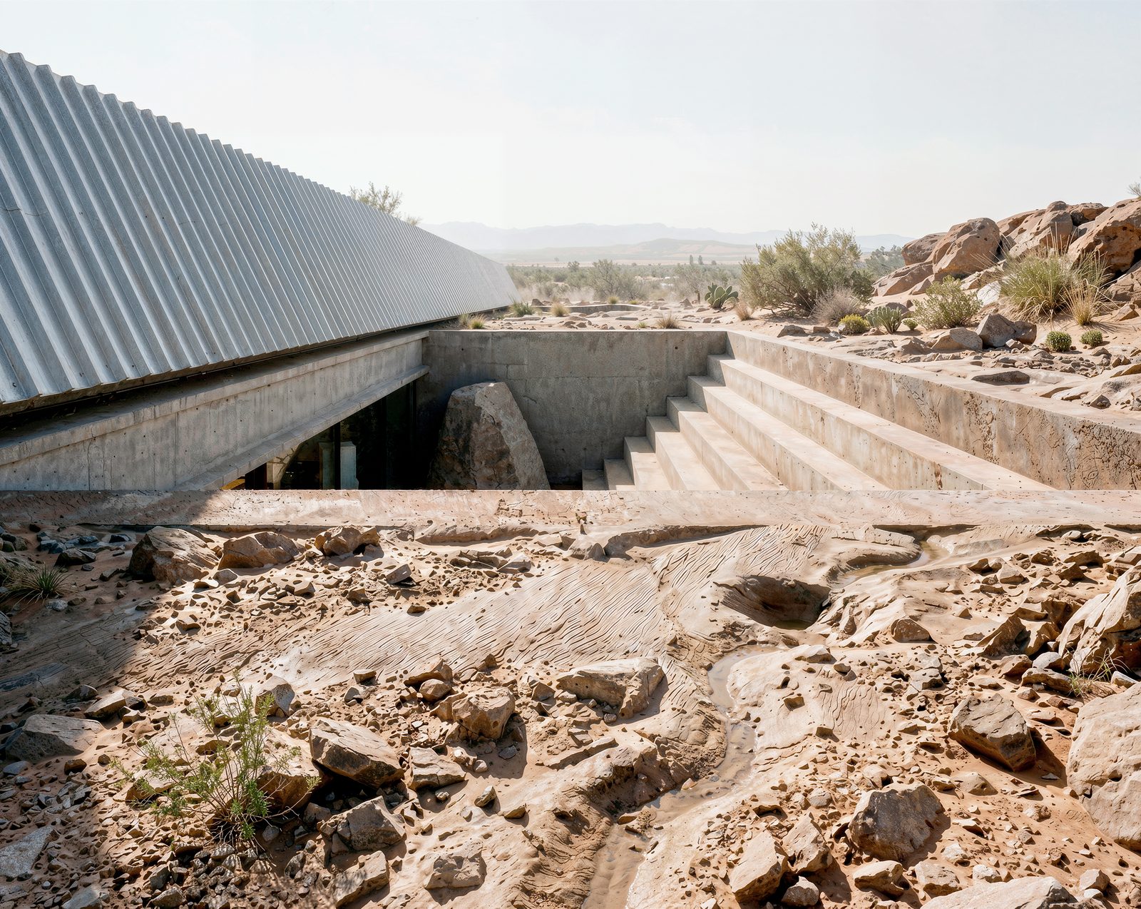 Long corrugated-roof intervention set into an arid rocky landscape, visualised by ro01.studio