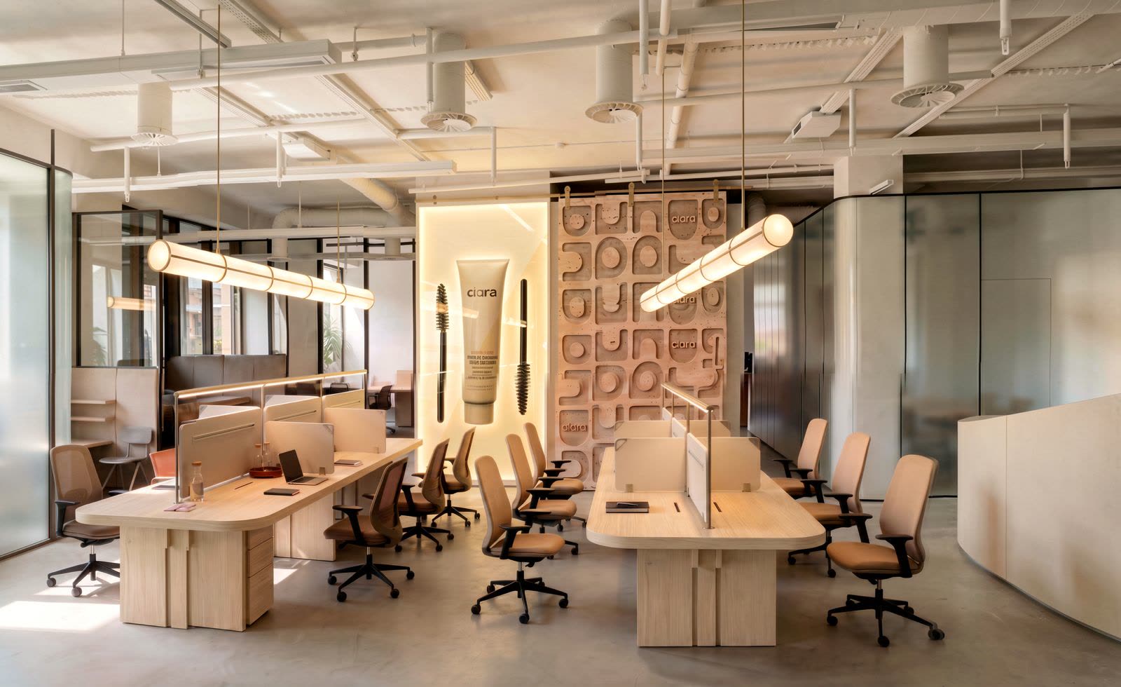 Open-plan workspace with timber desks, sculpted feature wall and warm tubular lighting, visualised by third floor